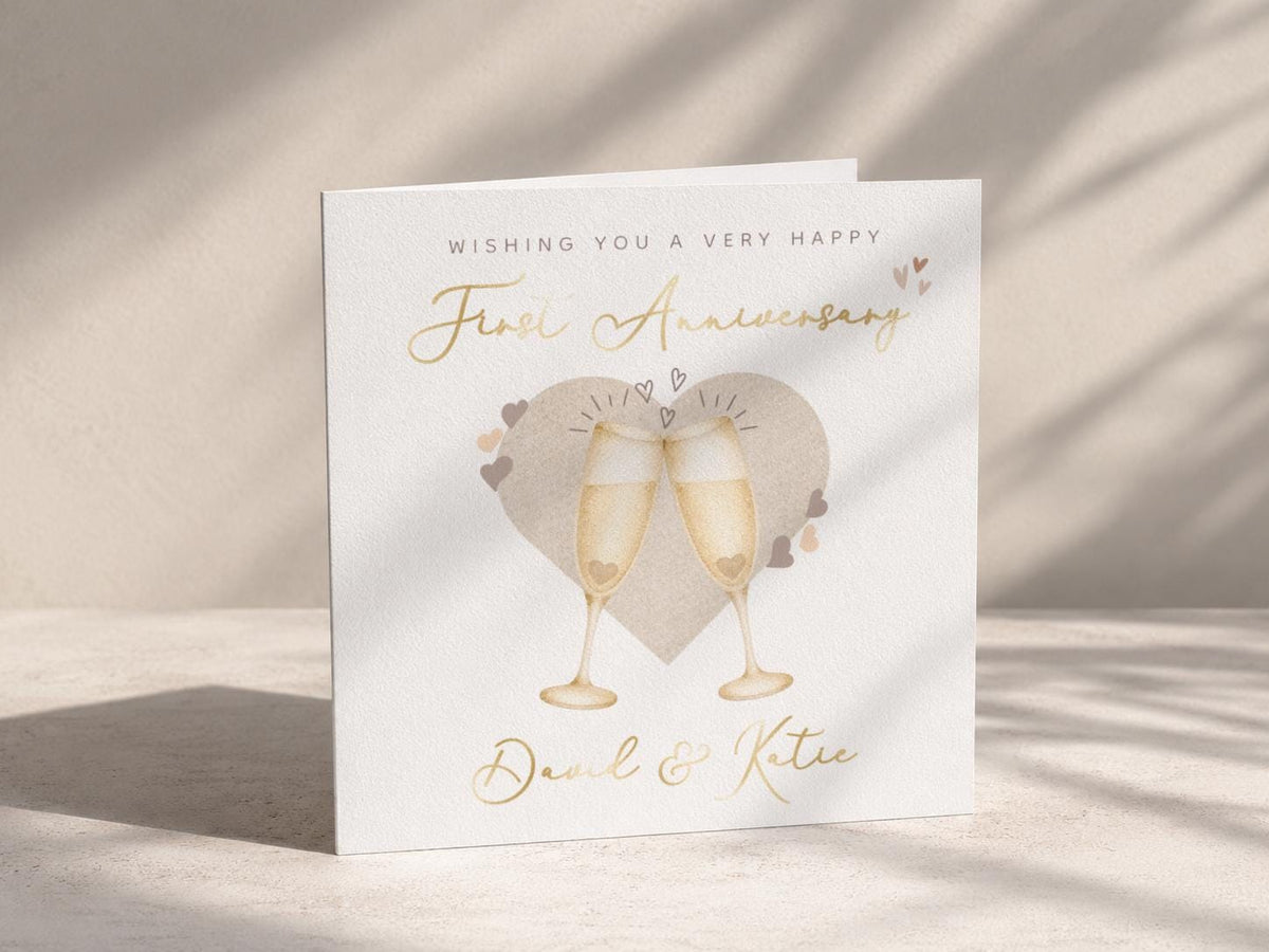 Personalised First Anniversary Card for Couple with Names and Gold Foil Champagne Glasses
