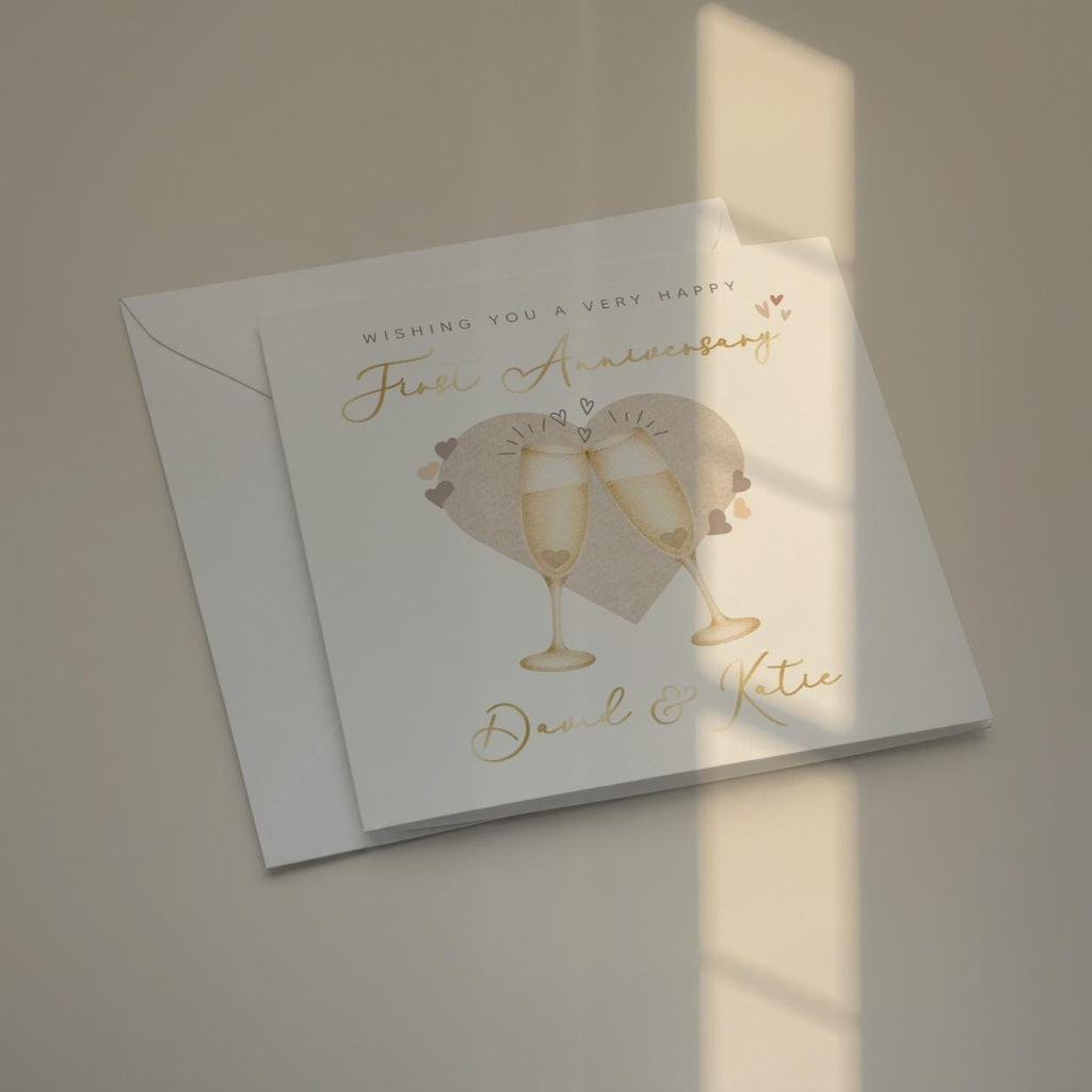 Personalised First Anniversary Card for Couple with Names and Gold Foil Champagne Glasses
