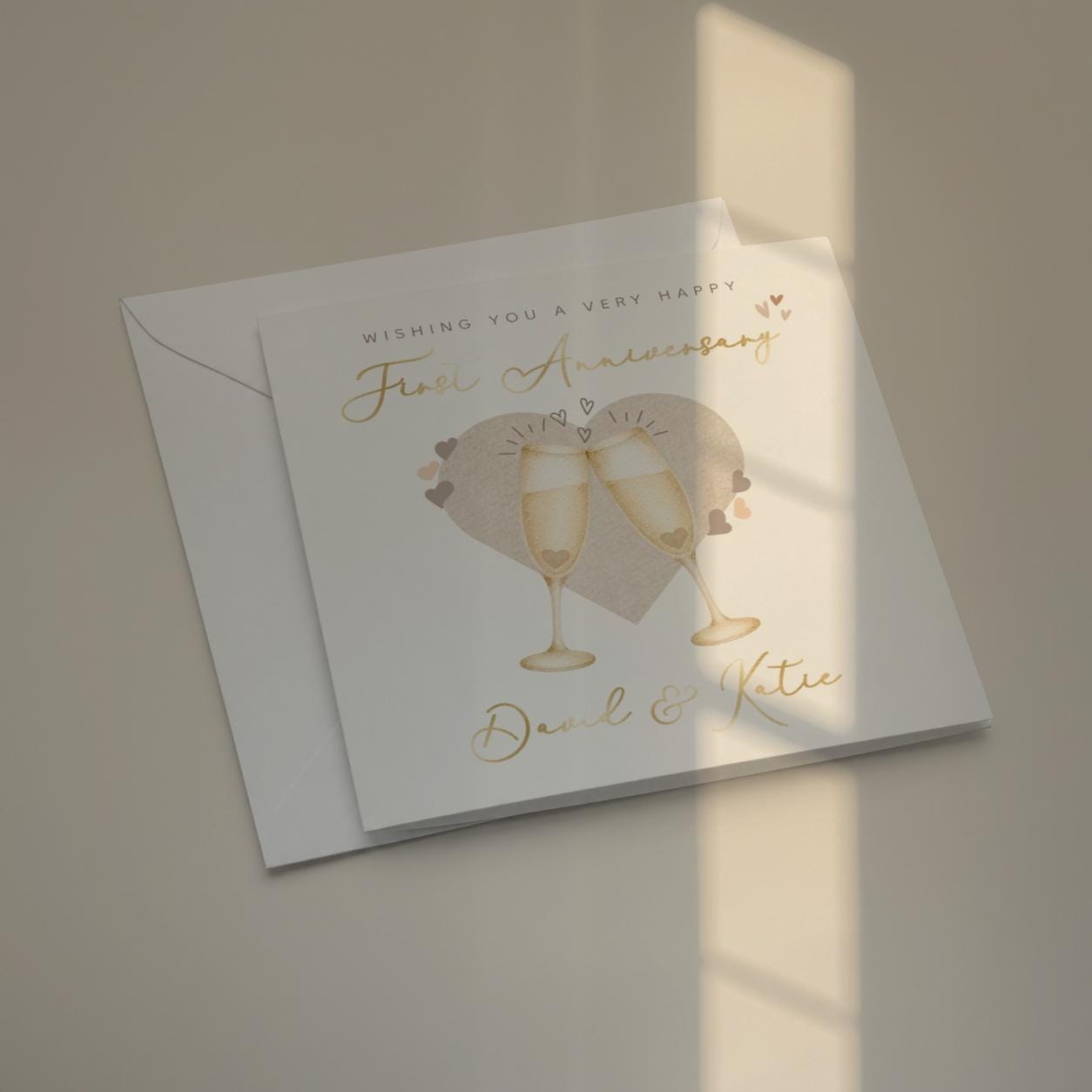 Personalised First Anniversary Card for Couple with Names and Gold Foil Champagne Glasses