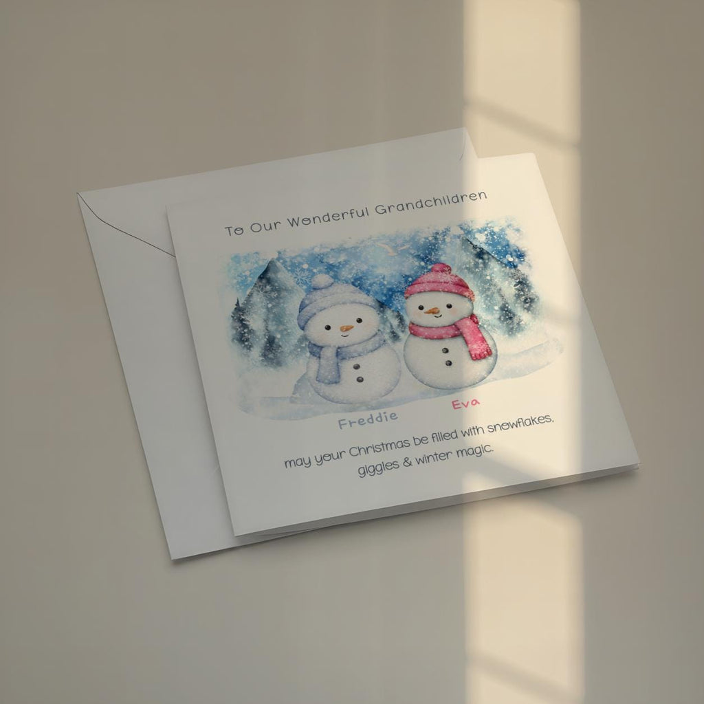 Two blue and pink snowmen personalised grandchildren Christmas card