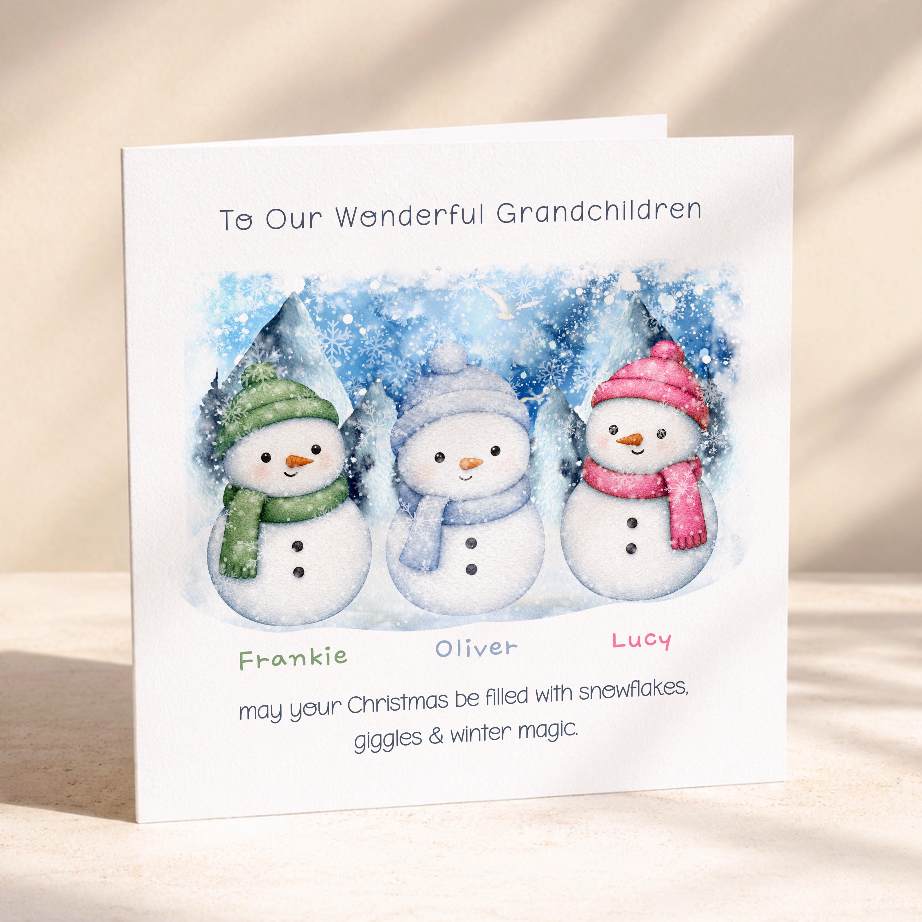 Two green and red snowmen personalised grandchildren Christmas card