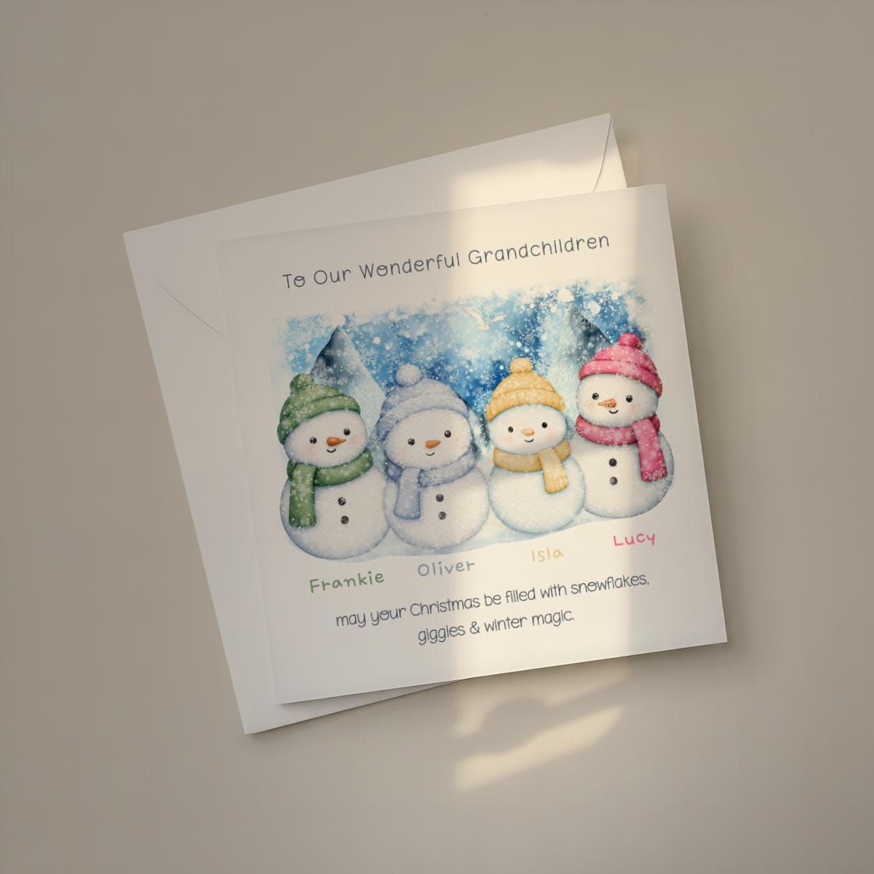 Three purple blue and pink snowmen personalised Christmas card